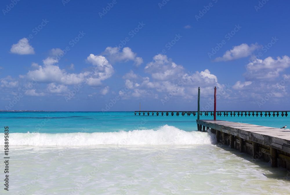 Seascape scenery with the wooden piers.