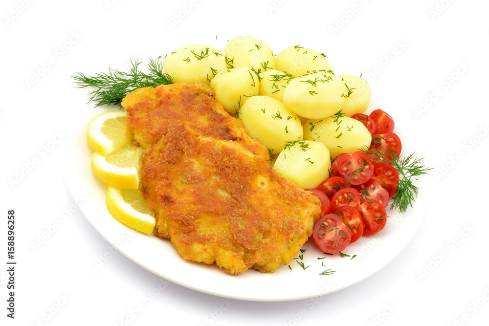filet z miruny smażony z ziemniakami i pomidorem Stock Photo Adobe Stock