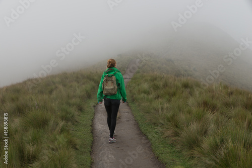 woman hiking on the mountain track
