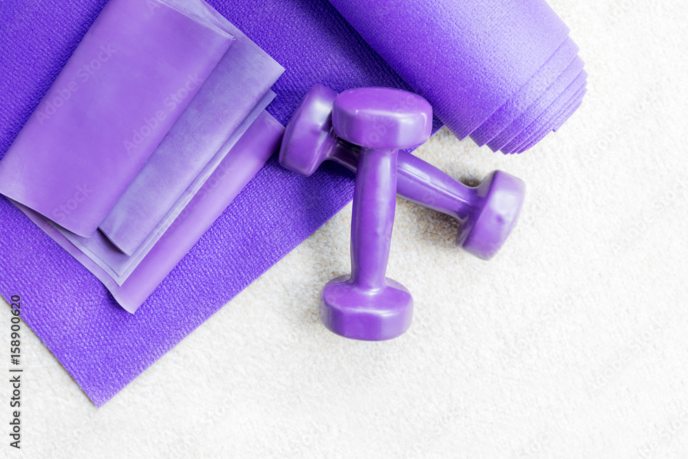 Fitness yoga pilates equipment props on carpet Fitness yoga pilates equipment props on carpet