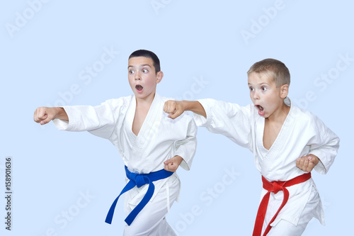 Karate boys are beating punches