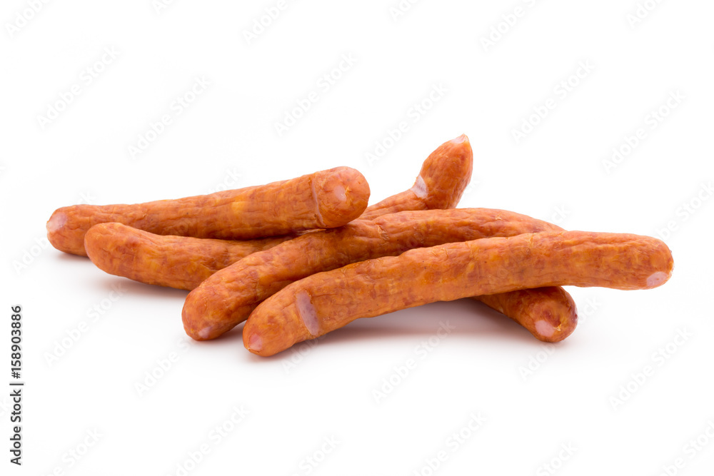 Stack of smoked sausages isolated on a white background. Stack of smoked sausages isolated on a white background.