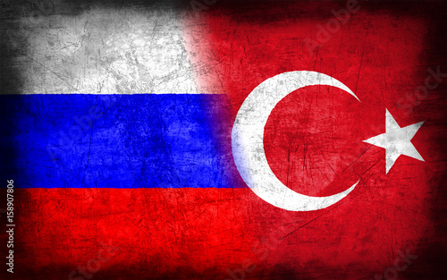 Russia and Turkey flag with grunge metal texture