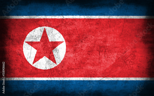 North Korea flag with grunge metal texture