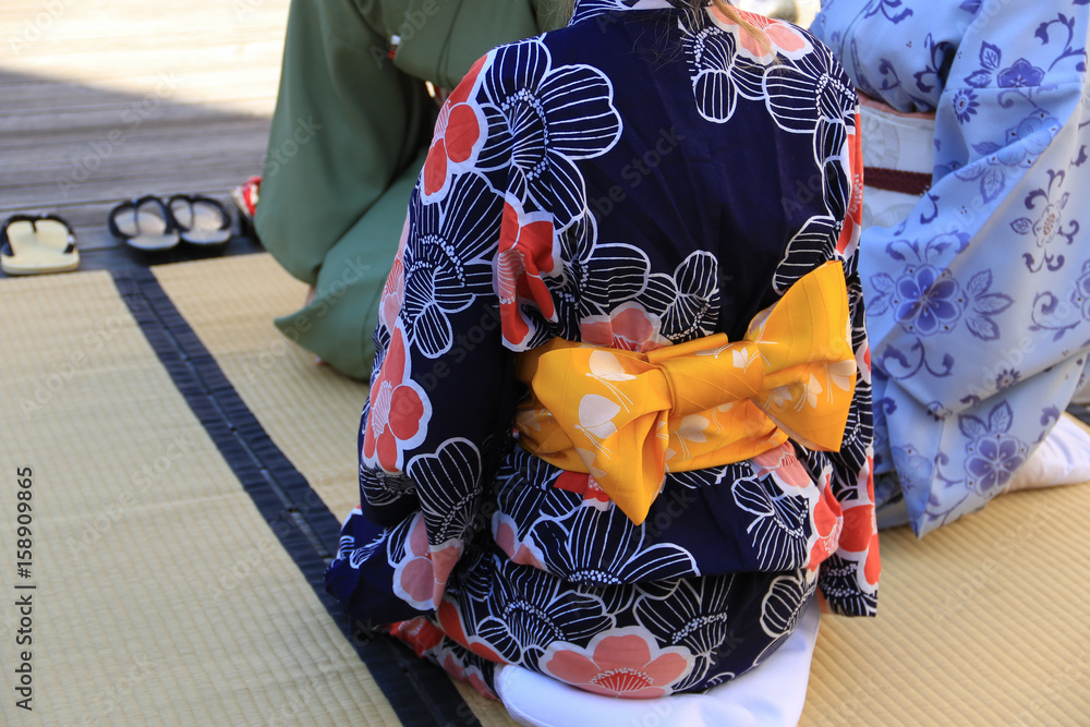 Colorful Japanese kimono and footwear on the tatami mat Stock Photo | Adobe  Stock