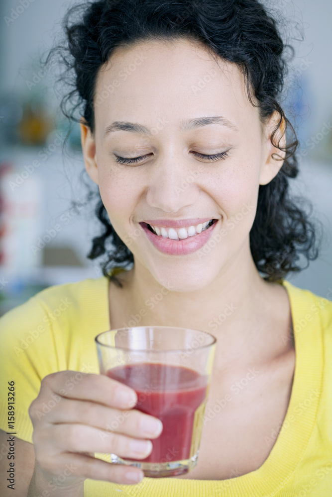 Woman drinking smoothie Woman drinking smoothie