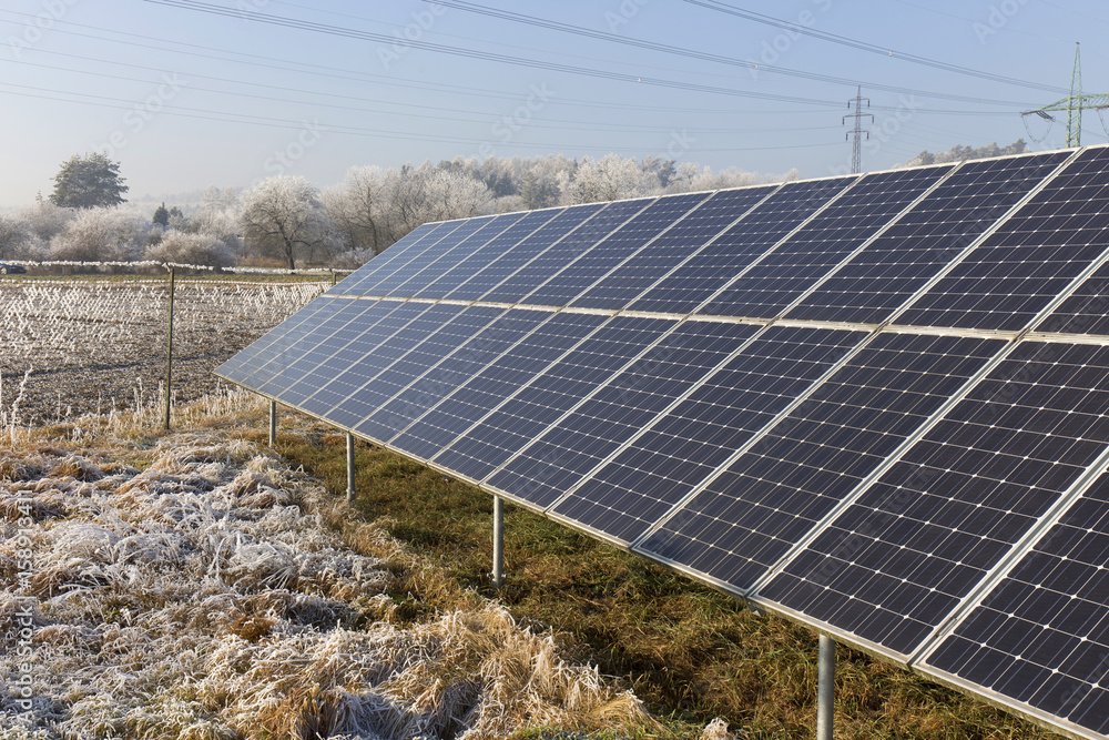 Solar Power Station in the snowy freeze winter Nature Solar Power Station in the snowy freeze winter Nature