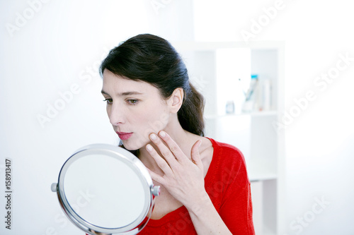 Woman with mirror