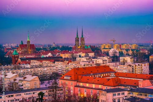 Panorama illuminated old town of Wroclaw at night. Popular travel destination in Poland. High dynamic range.