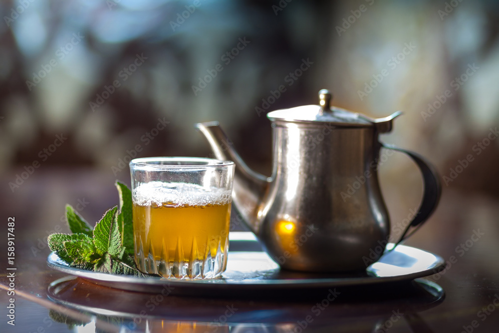 view of a moroccan traditional tea on a table view of a moroccan traditional tea on a table