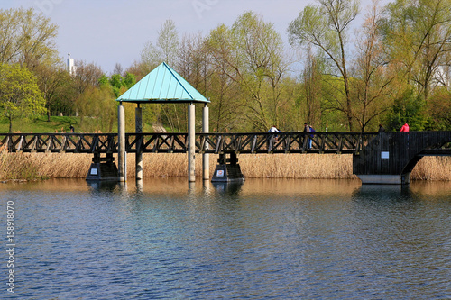 Aerial view of Freiburg Seepark which is a beautiful lake within the inofficial capital of Black Forest, Germany photo