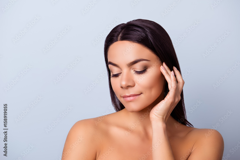 So cute and pure! Young pretty hispanic charming girl is touching gently her shining healthy bronze skin, so sensual, smooth and healthy So cute and pure! Young pretty hispanic charming girl is touching gently her shining healthy bronze skin, so sensual, smooth and healthy