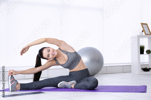 Attractive fitness woman ex...