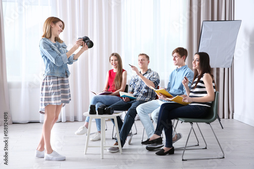 Group of students with inst...