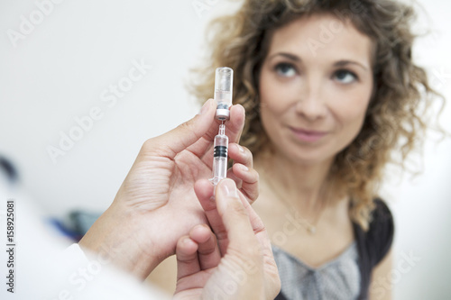 Vaccinating a woman