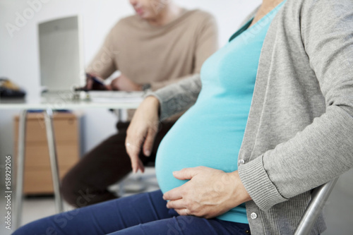 Pregnant woman in consultation