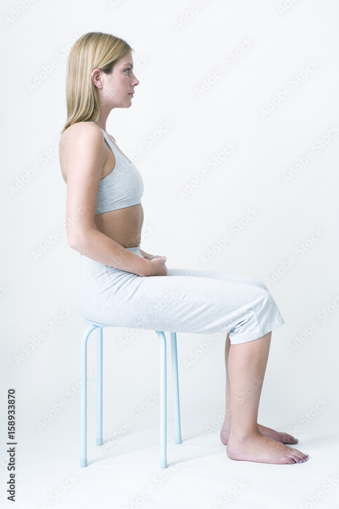 Model Sophrology is a technique of relaxation based notably on breathing The practictioner proposes different exercises to relax Here the exercice consists in being sitted (the back straight) with the two hands placed one on the other (the thumbs touch each other) The person then concentrates on her breathing See images nﾰ3595909, 3596009, 3596109, 3596209 to see the whole exercise