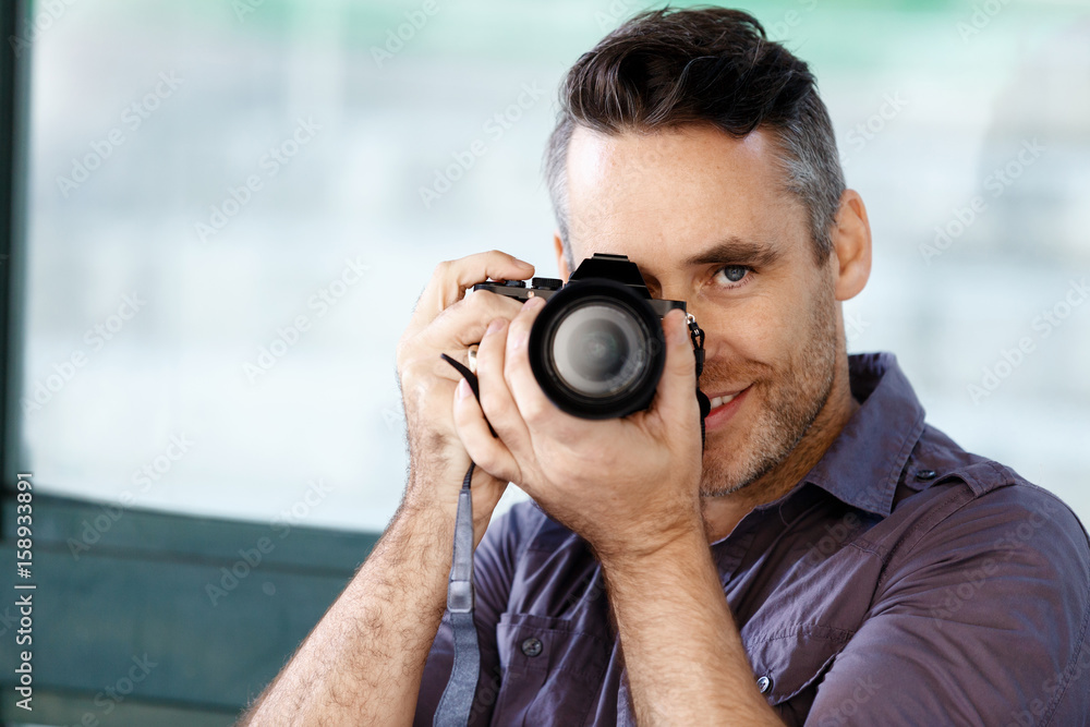 Male photographer taking picture Male photographer taking picture