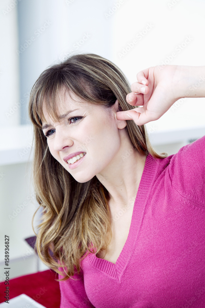 Fototapeta premium Woman suffering from earache
