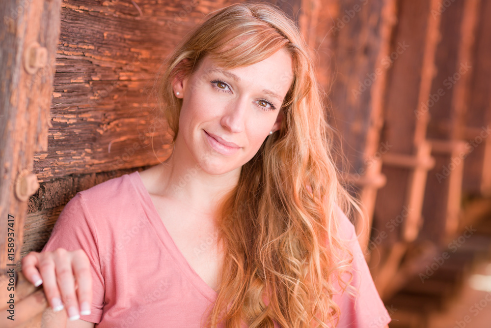 Fototapeta premium Outdoor Portrait of Young Adult Brown Eyed Woman.