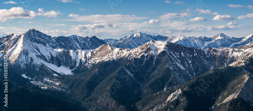Panorama of the mountain ridge Tunkinsky Goltsy