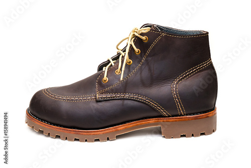 new dark brown color full grain nubuck leather boots with thick anti-slip rubber sole on isolated white background.