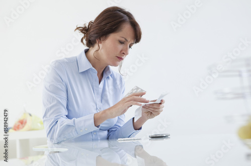 Woman taking medication