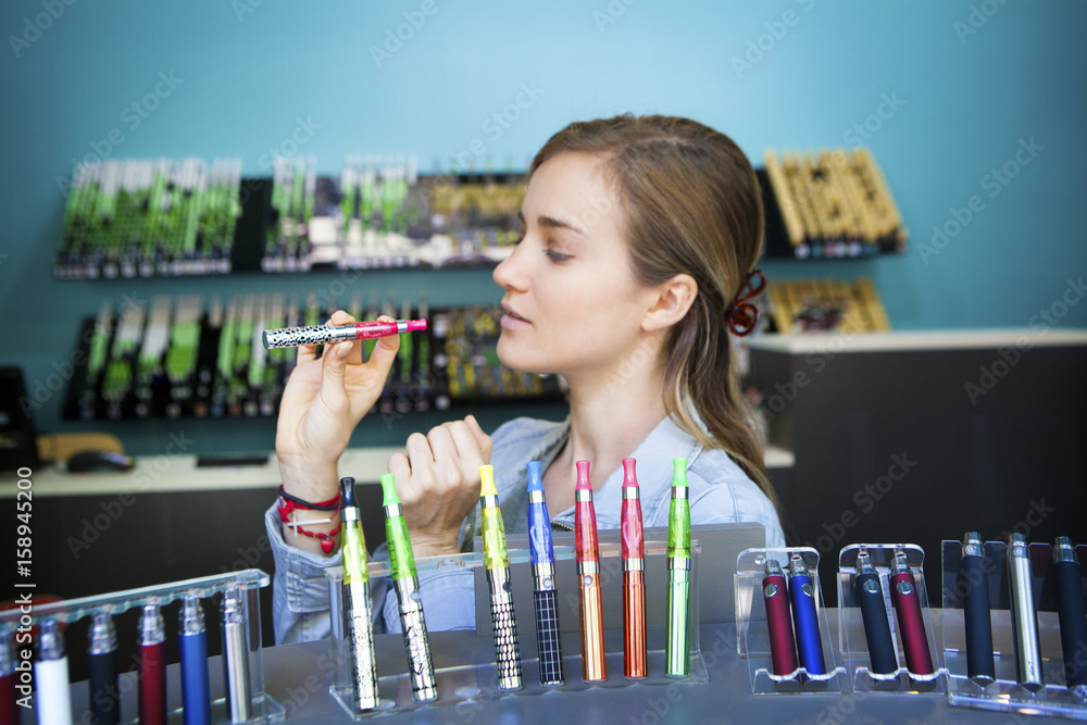 In a shop selling e-cigarettes, Paris, France In a shop selling e-cigarettes, Paris, France