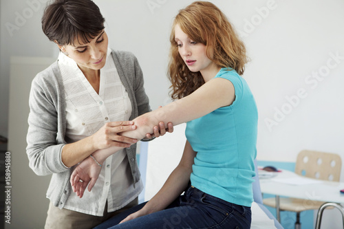 Dermatology consultation woman photo