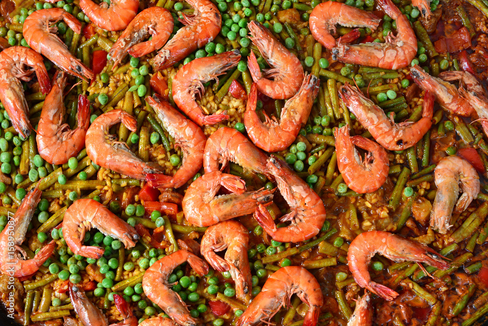 Paella with seafood and chicken. Prepared in wok. Paella with seafood and chicken. Prepared in wok.