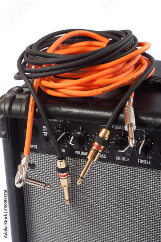 Close-up of guitar amplifier with jack cable
