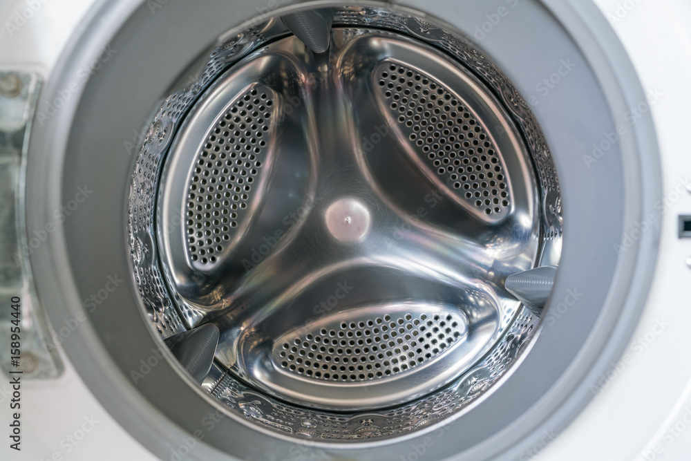 White washing machine with opened door close-up - Empty inside White washing machine with opened door close-up - Empty inside