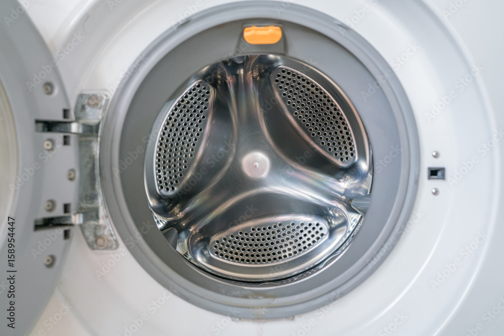 White washing machine with opened door close-up - Empty inside 