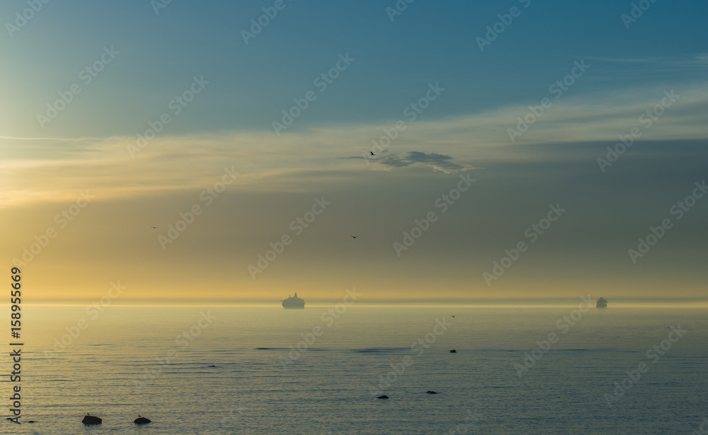 Sunset and boat on the sea