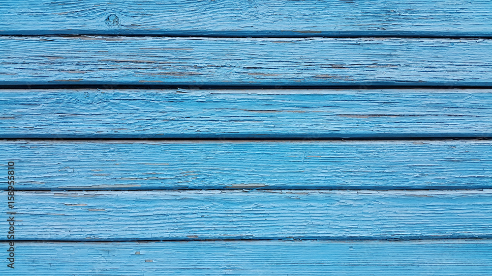 Obraz premium Texture of old wooden blue fence