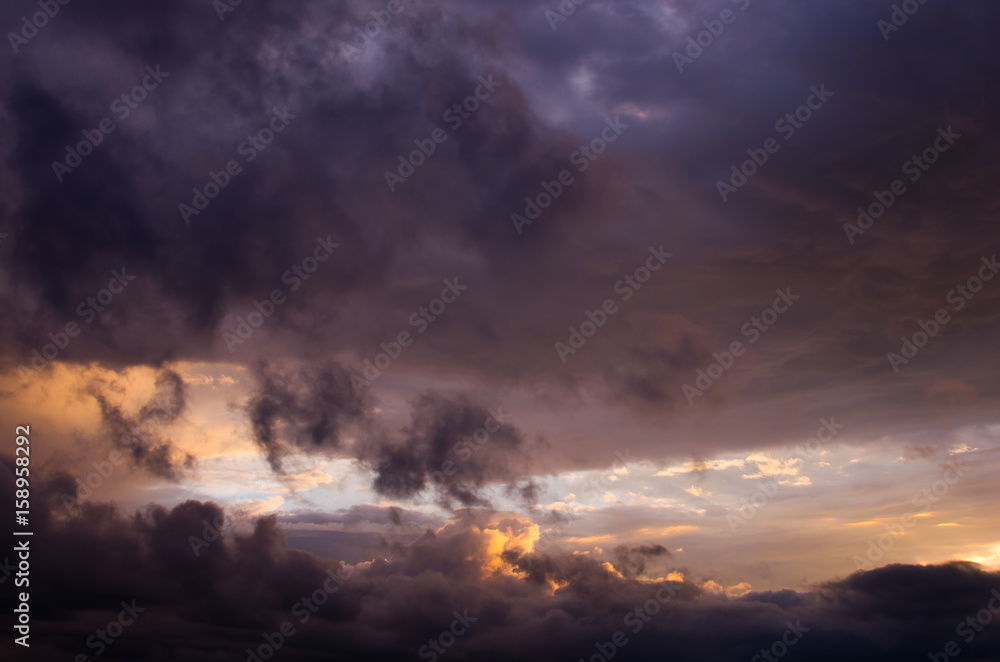 Storm clouds in the sunset light