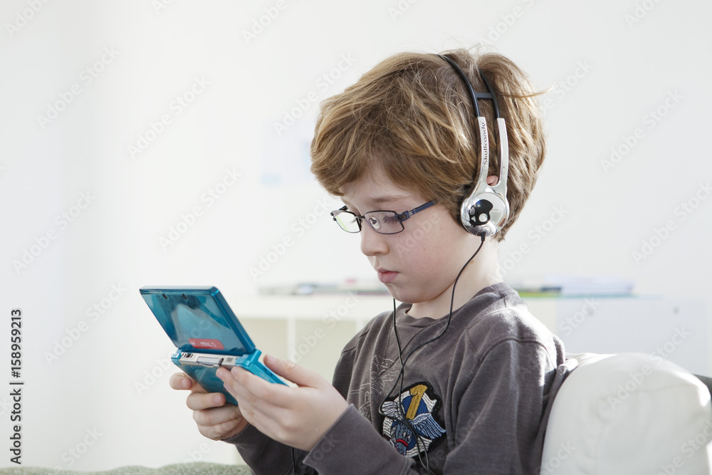 Child playing with video game