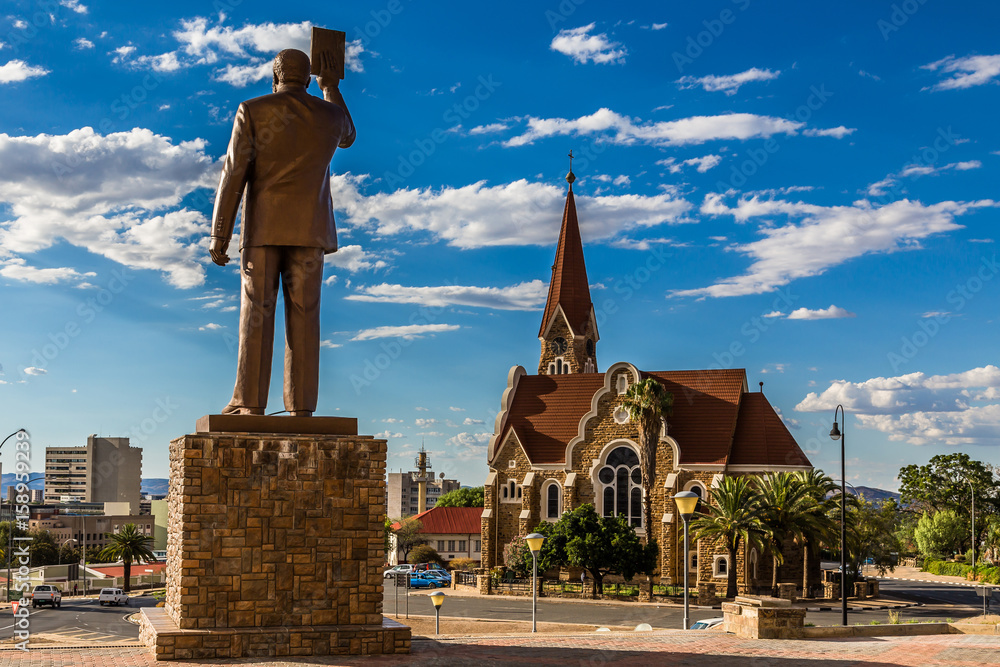 Fototapeta premium First Namibian President monument and Luteran Christ Church in the center of Windhoek, Namibia