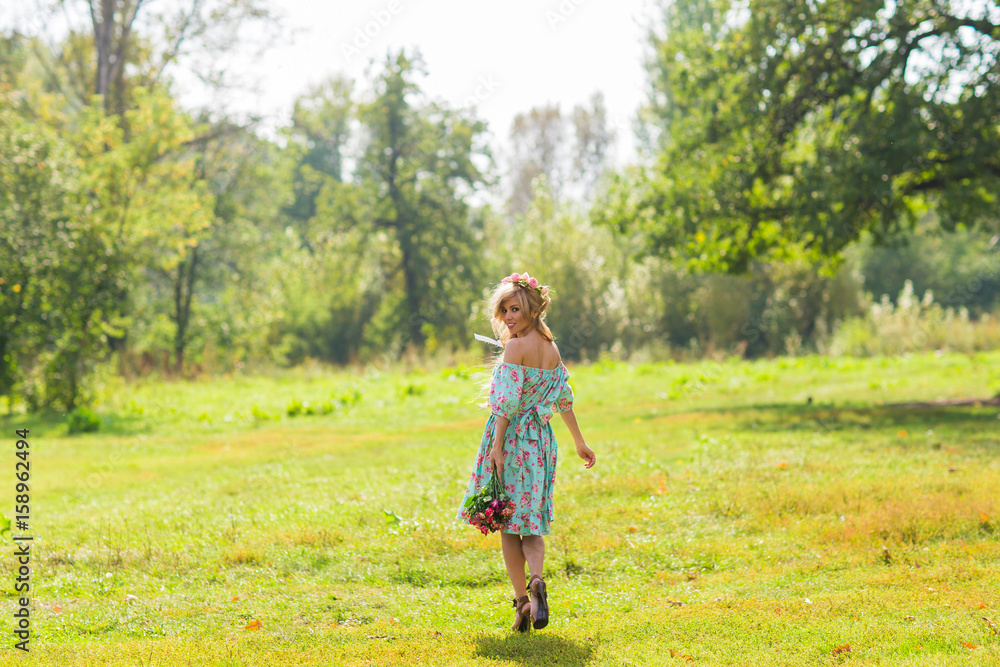 Portrait of a young beautiful woman on the nature Portrait of a young beautiful woman on the nature