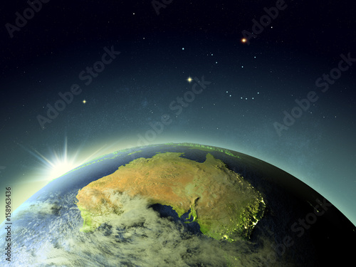Fototapeta Naklejka Na Ścianę i Meble -  Sunset above Australia from space