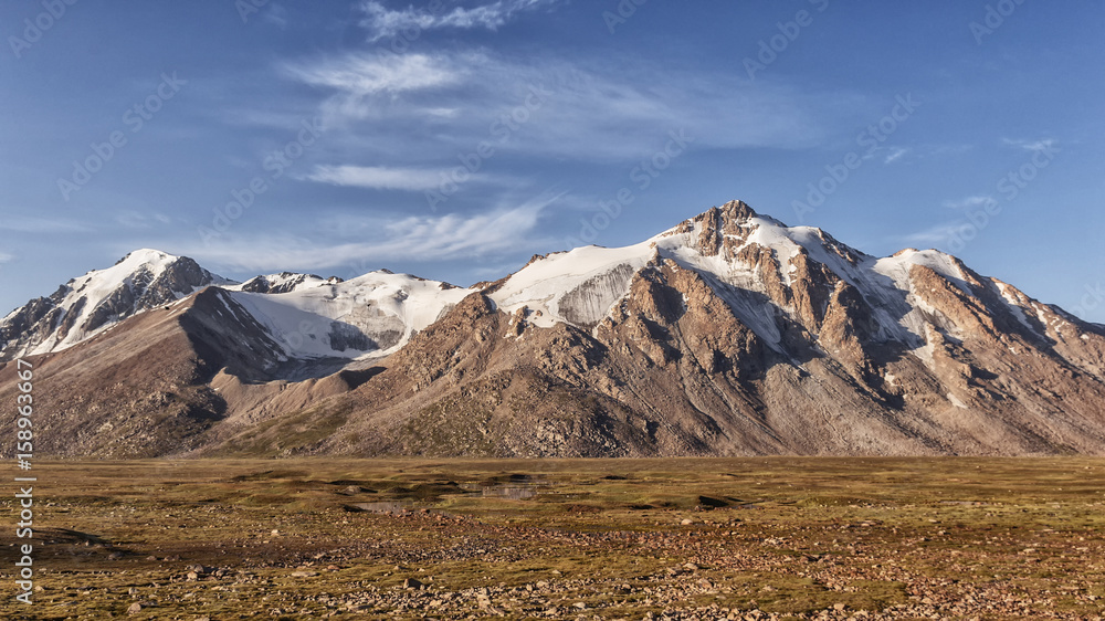 Landscape of mountains and glaciers in the sunny weather