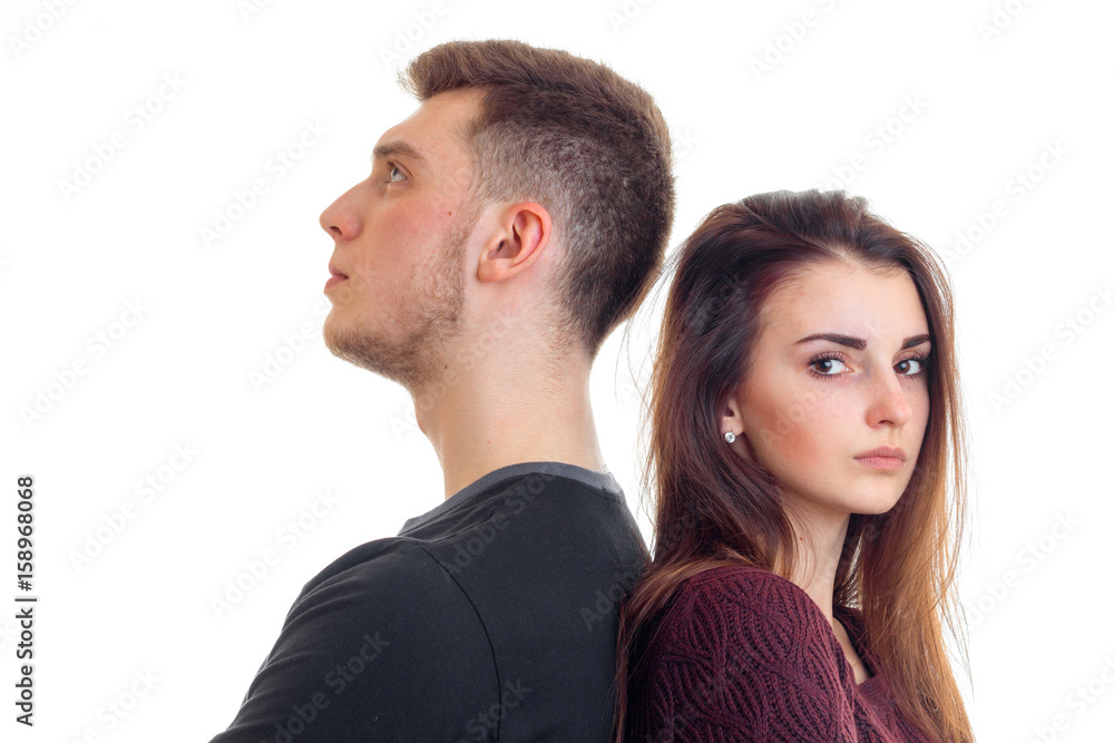 Portrait of serious young couple in studio Portrait of serious young couple in studio