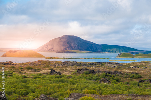 Sunset time in volcanic landscape at Myvatn Lake, aka Lake of mosquitos, northern Iceland.