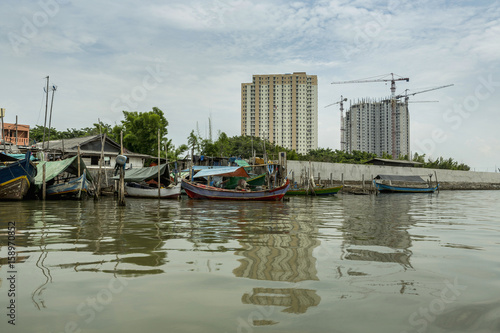 Fototapeta Naklejka Na Ścianę i Meble -  Sunda Kelapa old Harbour with fishing boats, ship and docks in Jakarta, Indonesia