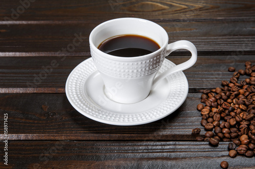 Coffee mug and coffee beans.