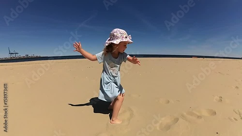 Wallpaper Mural Little Girl Dancing Spinning on Sunny Beach Slow Motion Torontodigital.ca