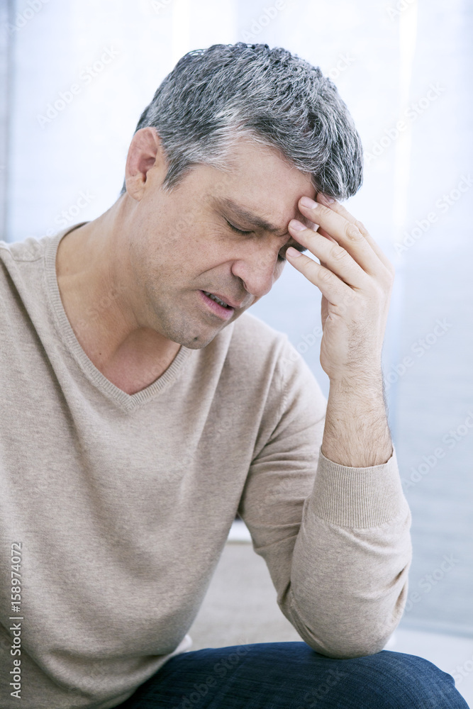 Man with headache Man with headache