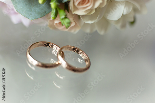 wedding rings glass surface