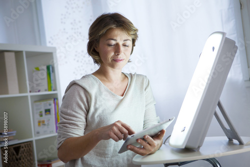 Woman light therapy photo