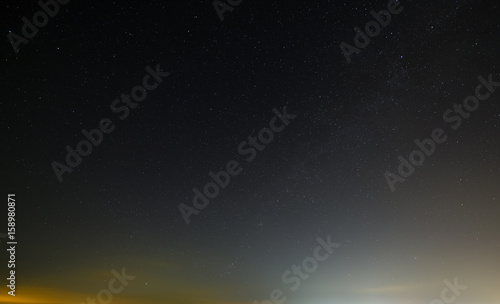 Night starry sky with clouds  before dawn.